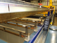 Automated metal-finishing benefits from Igus energy cable management