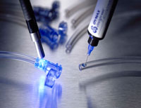 Light curing adhesives