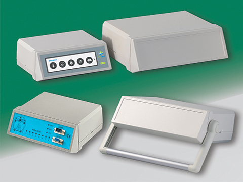 Compact desktop/portable instrument enclosures with sloping front