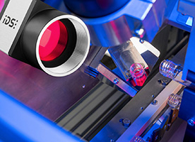 Intelligent multi-camera system for quality control of vaccine bottles