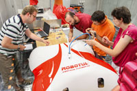 Service robot scales negative slopes