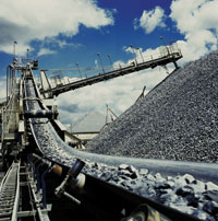 Controlling back running of inclined conveyors