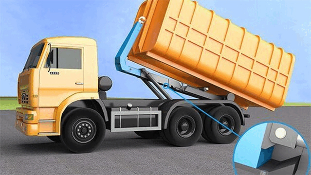 Inductive sensors prevent overloading of hook-lift truck arm