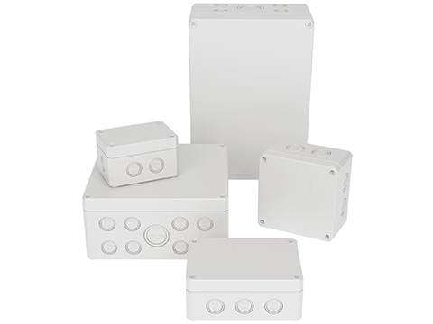 Enclosures with pre-formed metric knockouts
