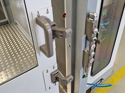 Protecting operators during access to robotic machines