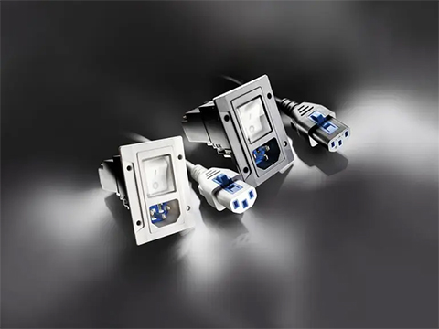 Power entry module with magnetic release
