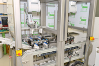 Dynamic track system drives robot cell's product transportation