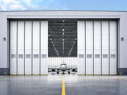 Smart position control for aircraft hanger doors