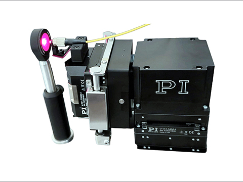 Cost-optimised, high-speed fibre-alignment system for silicon photonics