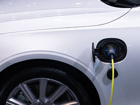Solving the EV charging cable problem with compact motion control