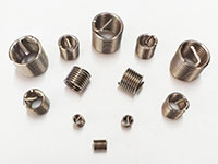 Wire thread inserts for high-strength threads in soft materials