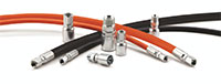 Thermoplastic hydraulic hoses and fittings designed to work together, enabling safe and effective fluid conveyance 