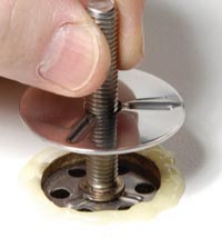 Fastenings for composite panels