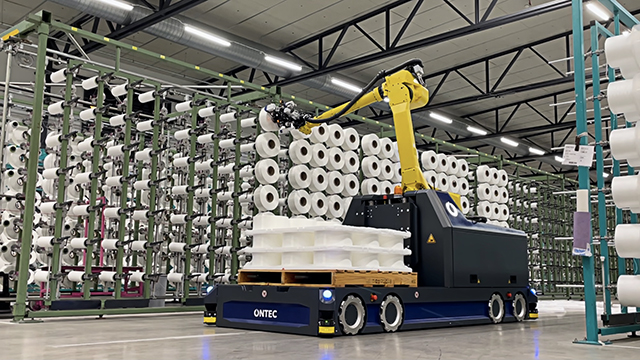 Smart robotic system automates placement of coil creels