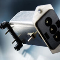 Filtered entry module meets EMC needs